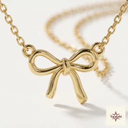 Charming Gold Bow Pendant Necklace thumbnail 2