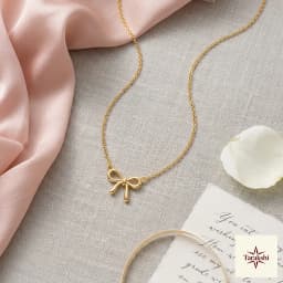 Charming Gold Bow Pendant Necklace thumbnail 3