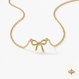 Charming Gold Bow Pendant Necklace thumbnail 1